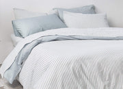 envello Crisp Chambray blue striped sheet set on bed