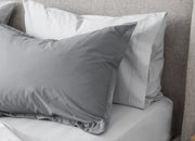 envello light grey cotton Premium Percale pillowcase with contrasting dark grey duvet sham on bed