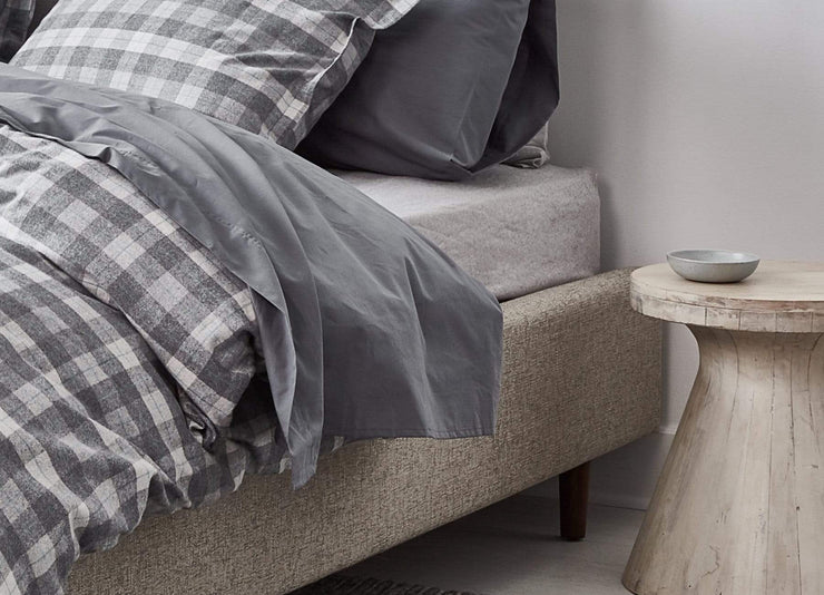 envello dark grey cotton Premium Percale sheet on bed with grey plaid Cozy Flannel Duvet Set