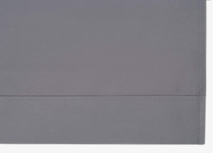 Close-up of envello dark grey cotton Premium Percale fitted sheet