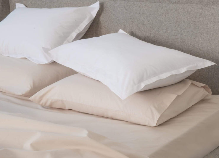 envello bone coloured cotton Premium Percale pillowcases with contrasting white duvet shams on bed